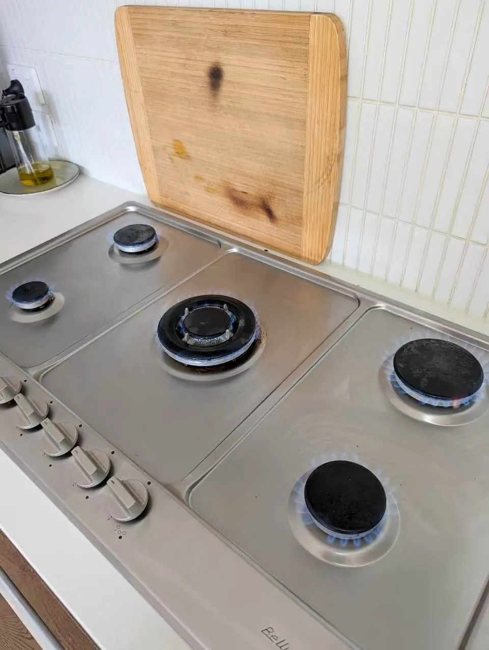 Four-burner cooktop with components refitted